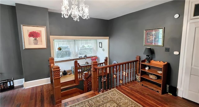 615 N Jefferson St, Carrollton, MO 64633 - dining area featuring wood finished floors and a chandelier