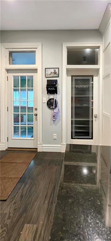 615 N Jefferson St, Carrollton, MO 64633 - detailed view of baseboards and wood finished floors