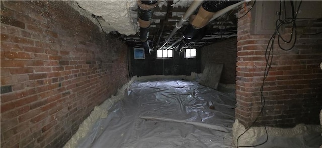 615 N Jefferson St, Carrollton, MO 64633 - below grade area featuring brick wall