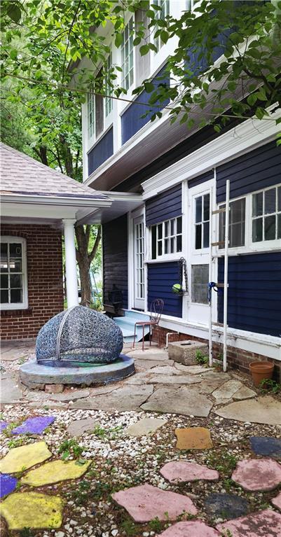 615 N Jefferson St, Carrollton, MO 64633 - view of exterior entry with brick siding