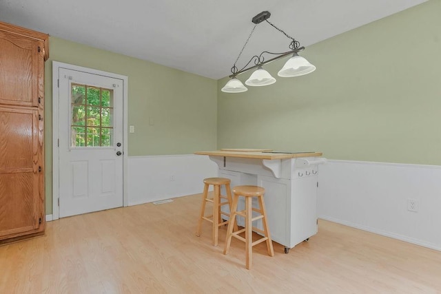 13821 S Shannan St, Olathe, KS 66062 - dining room with light wood-style floors and baseboards
