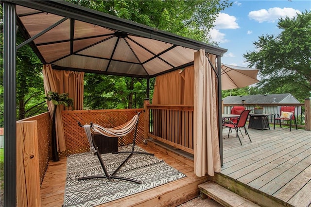 117 Ellison Way, Independence, MO 64050 - wooden deck with a gazebo and outdoor dining area