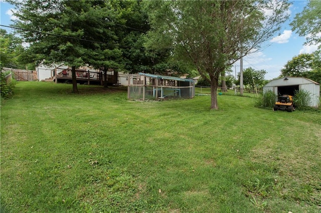 117 Ellison Way, Independence, MO 64050 - view of yard featuring an outbuilding and a wooden deck