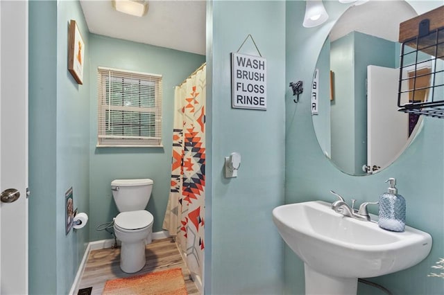 117 Ellison Way, Independence, MO 64050 - full bath featuring wood finished floors and a shower with curtain