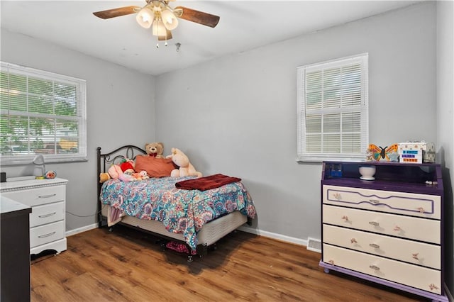117 Ellison Way, Independence, MO 64050 - bedroom featuring wood finished floors and a ceiling fan