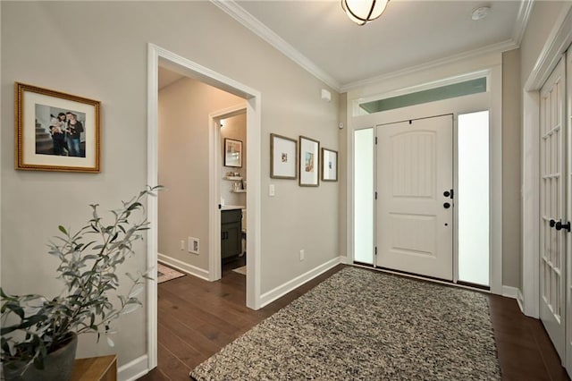 144 SE Riley St, Blue Springs, MO 64064 - foyer entrance featuring ornamental molding and dark wood finished floors