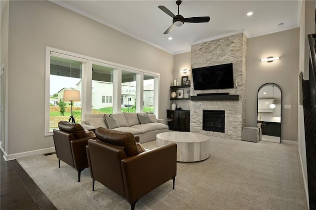 144 SE Riley St, Blue Springs, MO 64064 - living room with a ceiling fan, crown molding, a fireplace, and recessed lighting