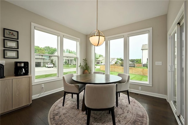 144 SE Riley St, Blue Springs, MO 64064 - dining room with baseboards and dark wood-style flooring