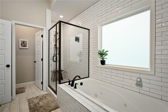 144 SE Riley St, Blue Springs, MO 64064 - bathroom with a whirlpool tub, a shower stall, plenty of natural light, and recessed lighting