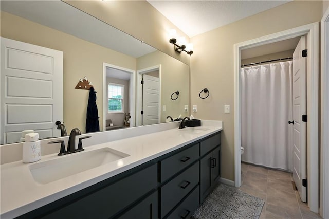 144 SE Riley St, Blue Springs, MO 64064 - bathroom featuring double vanity, tile patterned flooring, and curtained shower