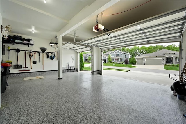 144 SE Riley St, Blue Springs, MO 64064 - garage featuring a garage door opener