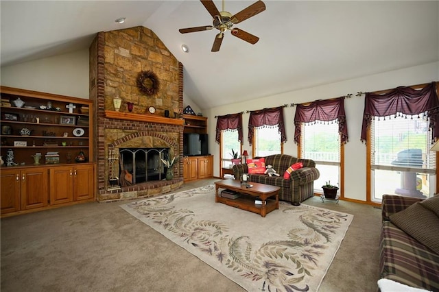 23800 Lucille Ln, Peculiar, MO 64078 - living room featuring a ceiling fan, lofted ceiling, carpet floors, and plenty of natural light