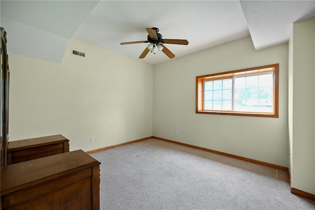 23800 Lucille Ln, Peculiar, MO 64078 - unfurnished bedroom featuring carpet floors and a ceiling fan