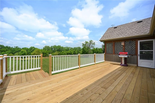 23800 Lucille Ln, Peculiar, MO 64078 - wooden deck featuring area for grilling and a lawn