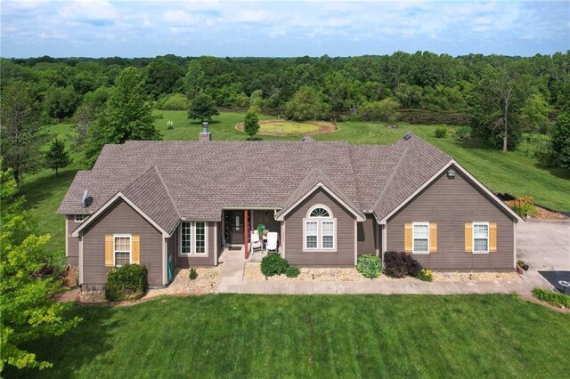 23800 Lucille Ln, Peculiar, MO 64078 - single story home with a front yard and a porch