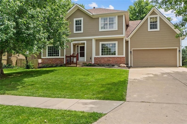 24137 W 57th Ter, Shawnee, KS 66226 - traditional-style house with brick siding, concrete driveway, a front lawn, and an attached garage