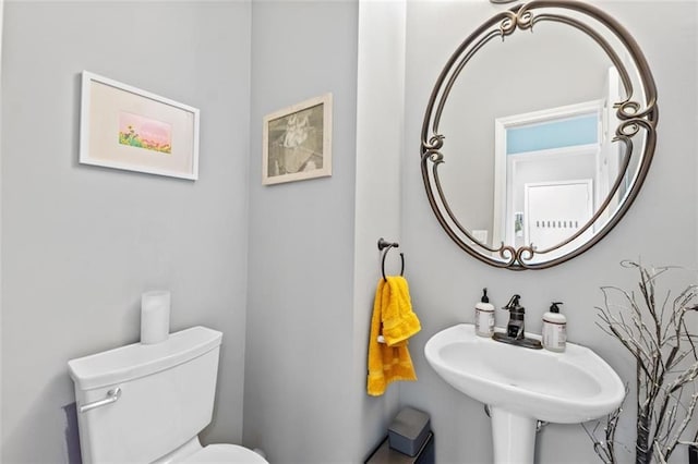 24137 W 57th Ter, Shawnee, KS 66226 - bathroom featuring toilet and a sink