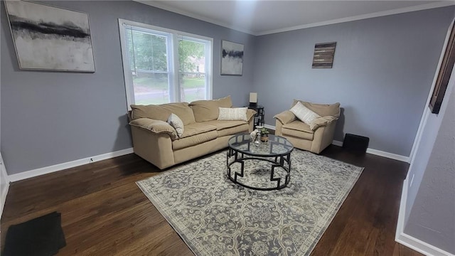 4216 E 67th Ter, Kansas City, MO 64132 - living area with crown molding and dark wood-type flooring