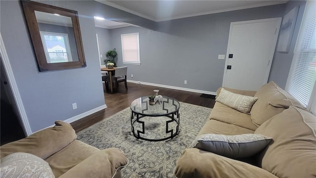 4216 E 67th Ter, Kansas City, MO 64132 - living area with dark wood finished floors and ornamental molding