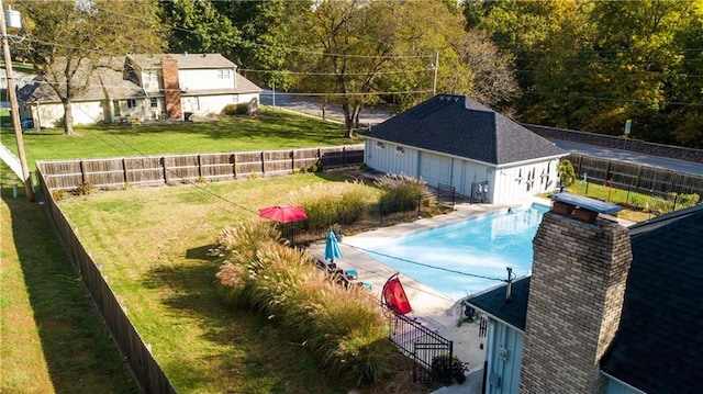1902 Snowdrop Cir, Liberty, MO 64068 - view of pool with a fenced backyard and an outdoor structure