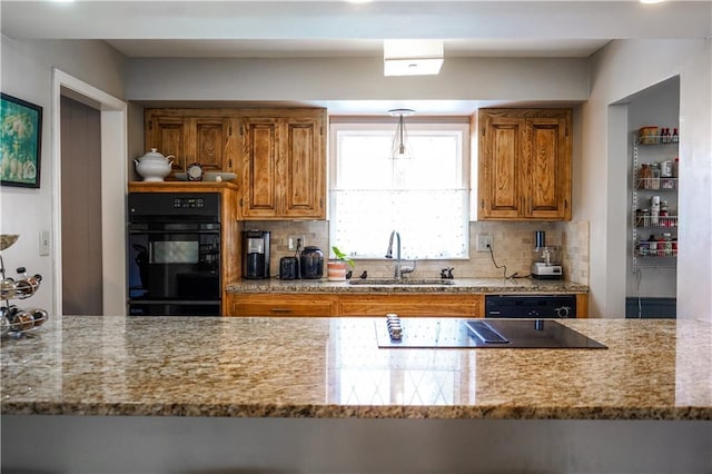 1902 Snowdrop Cir, Liberty, MO 64068 - kitchen with brown cabinetry, dishwasher, backsplash, and light stone counters