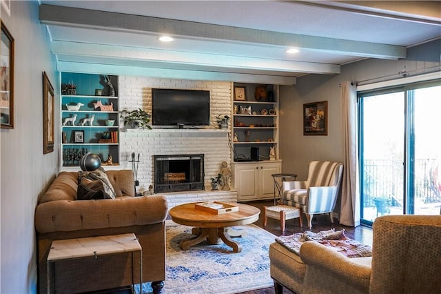 1902 Snowdrop Cir, Liberty, MO 64068 - living area featuring beamed ceiling, a brick fireplace, dark wood-style floors, and built in features