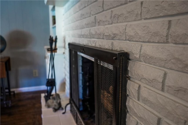 1902 Snowdrop Cir, Liberty, MO 64068 - detailed view of concrete block wall and a glass covered fireplace