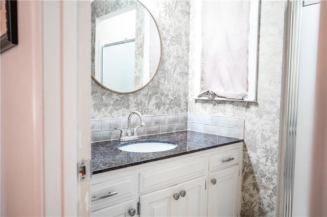 1902 Snowdrop Cir, Liberty, MO 64068 - bathroom with wallpapered walls and vanity