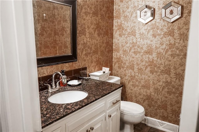 1902 Snowdrop Cir, Liberty, MO 64068 - half bath featuring wallpapered walls, vanity, and tile patterned flooring