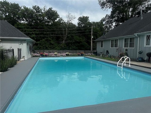 1902 Snowdrop Cir, Liberty, MO 64068 - view of pool with a fenced backyard