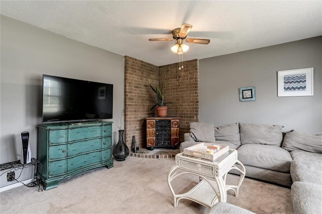 34065 W 135th St, Olathe, KS 66061 - living area featuring ceiling fan, carpet floors, and a textured ceiling
