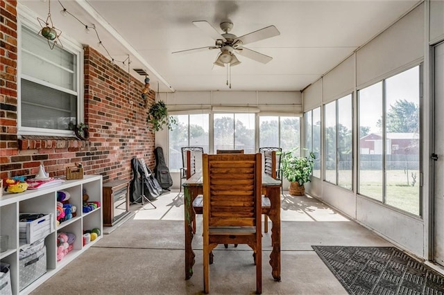34065 W 135th St, Olathe, KS 66061 - sunroom with ceiling fan and outdoor dining area