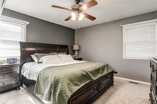 34065 W 135th St, Olathe, KS 66061 - bedroom with light carpet and a ceiling fan