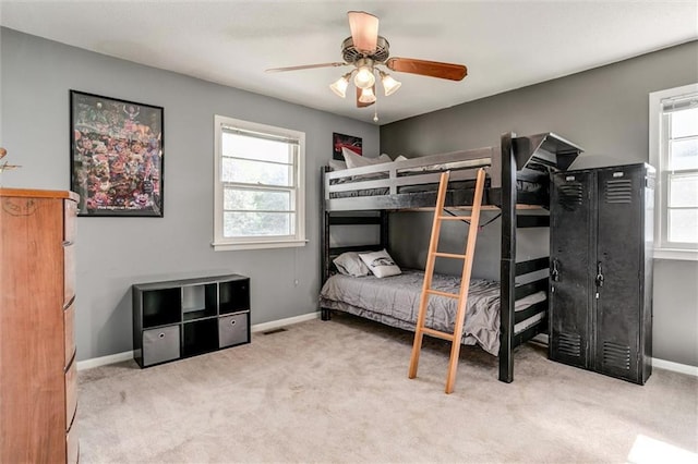 34065 W 135th St, Olathe, KS 66061 - bedroom with multiple windows, carpet, and ceiling fan