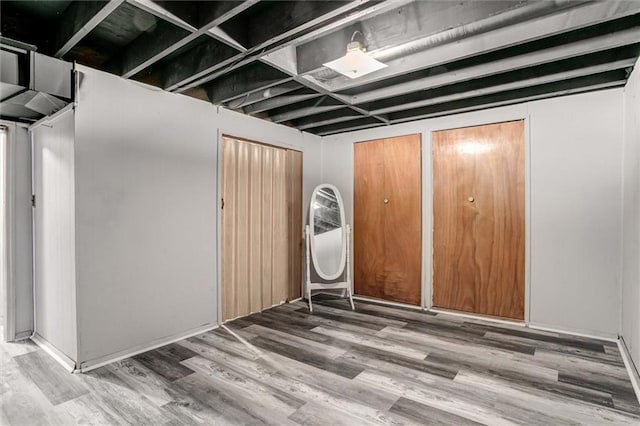 34065 W 135th St, Olathe, KS 66061 - below grade area with wood finished floors