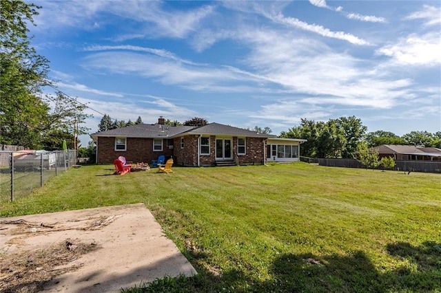 34065 W 135th St, Olathe, KS 66061 - back of house with brick siding and a fenced backyard