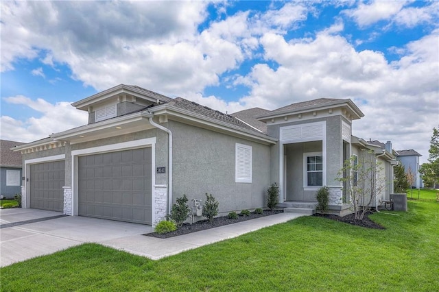 24110 W 95th St, Lenexa, KS 66227 - view of front facade with a front lawn, an attached garage, concrete driveway, and stucco siding