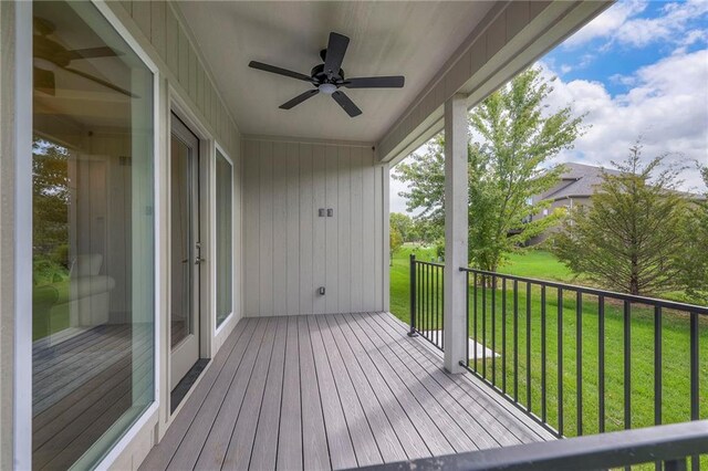 24110 W 95th St, Lenexa, KS 66227 - wooden terrace featuring ceiling fan and a yard