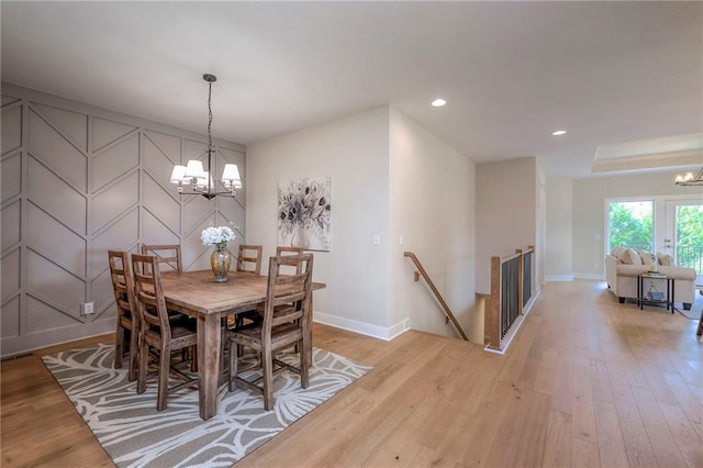 24110 W 95th St, Lenexa, KS 66227 - dining area featuring a chandelier, light wood-style floors, and recessed lighting