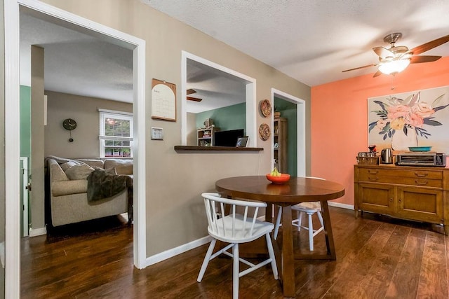 709 S 9th St, Louisburg, KS 66053 - dining room with dark wood-style floors and ceiling fan