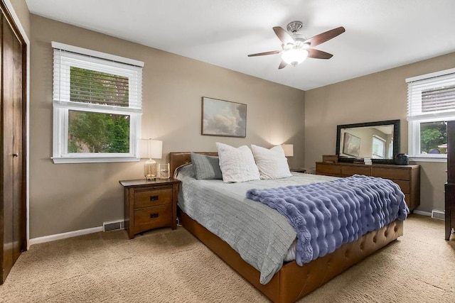 709 S 9th St, Louisburg, KS 66053 - bedroom with light carpet and ceiling fan