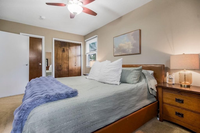 709 S 9th St, Louisburg, KS 66053 - bedroom featuring light colored carpet, multiple closets, and ceiling fan