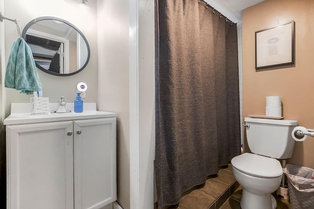 709 S 9th St, Louisburg, KS 66053 - bathroom featuring vanity, tile patterned floors, and curtained shower