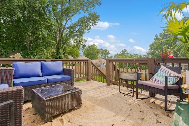 709 S 9th St, Louisburg, KS 66053 - wooden deck featuring an outdoor hangout area