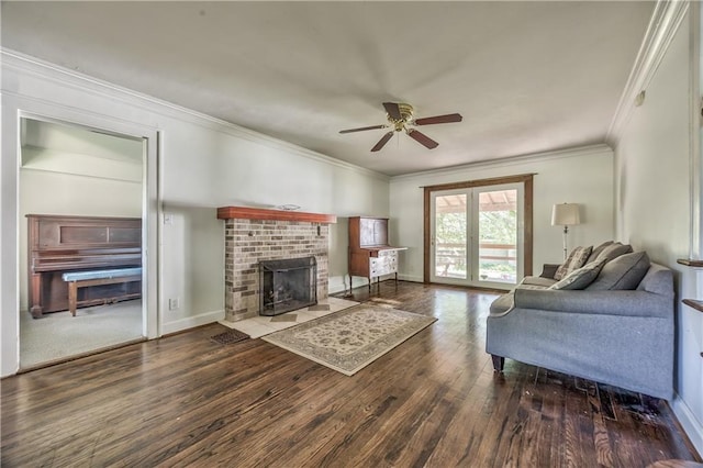 11 W 70th St, Kansas City, MO 64113 - living room with ceiling fan, wood finished floors, crown molding, and a brick fireplace