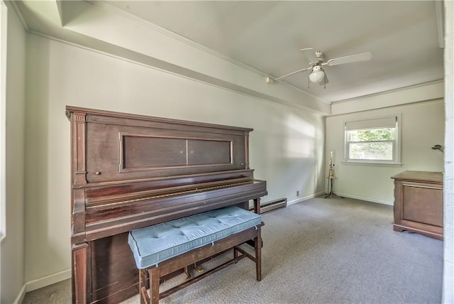 11 W 70th St, Kansas City, MO 64113 - living area featuring ornamental molding, carpet flooring, a ceiling fan, and a baseboard radiator
