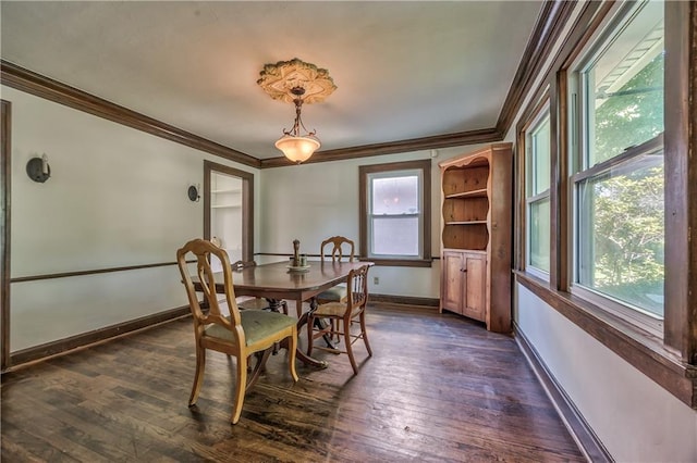 11 W 70th St, Kansas City, MO 64113 - dining area featuring ornamental molding and dark wood-style flooring