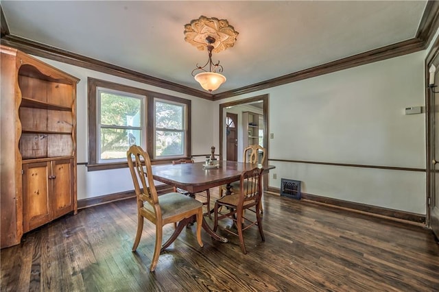 11 W 70th St, Kansas City, MO 64113 - dining area with crown molding and dark wood finished floors