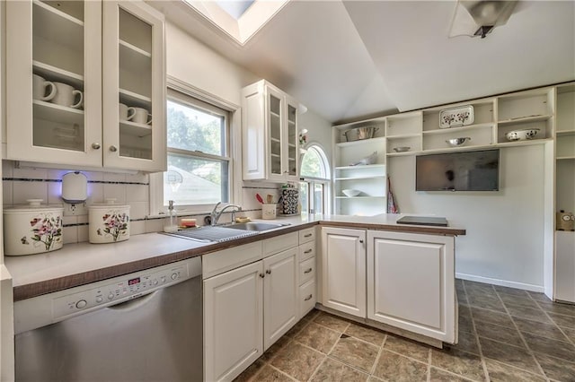 11 W 70th St, Kansas City, MO 64113 - kitchen with dishwasher, a peninsula, vaulted ceiling, open shelves, and white cabinets