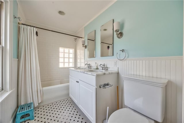 11 W 70th St, Kansas City, MO 64113 - full bathroom with wainscoting, vanity, shower / tub combo with curtain, and ornamental molding